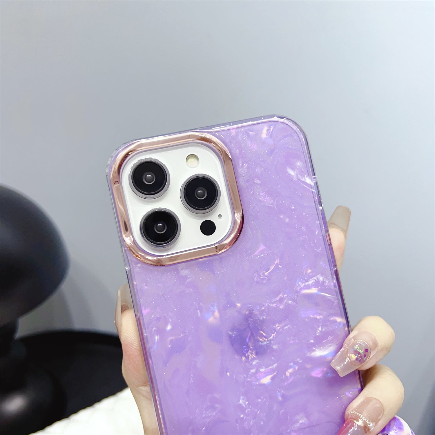 Uniqkart for iPhone 13 Pro Max 6.7 inch TPU+PC Phone Cover IMD Shell Pattern Anti-drop Case with Pearl Hand Chain - Light Purple Uniqkart for iPhone 13 Pro Max 6.7 inch TPU+PC Phone Cover IMD Shell Pattern Anti-drop Case with Pearl Hand Chain - Light Purple